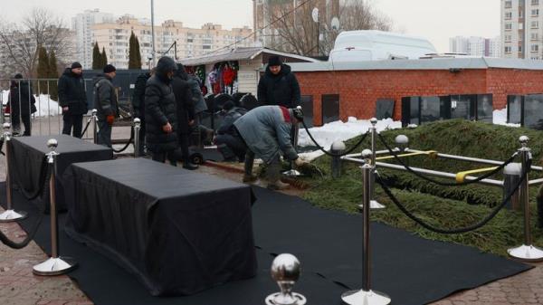 Workers prepare a grave wher<em></em>e Russian opposition leader Alexei Navalny due to be buried at the Borisovskoye Cemetery, in Moscow, Russia, Friday, March 1, 2024. Relatives and supporters of Alexei Navalny are bidding farewell to the opposition leader at a funeral in southeastern Moscow, following a battle with authorities over the release of his body after his still-unexplained death in an Arctic penal co<em></em>lony. (AP Photo)