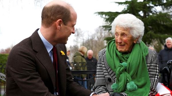 The Prince with Ruby McBurney, a surviving child of a Gresford Disaster victim Pic: PA / Molly Darlington