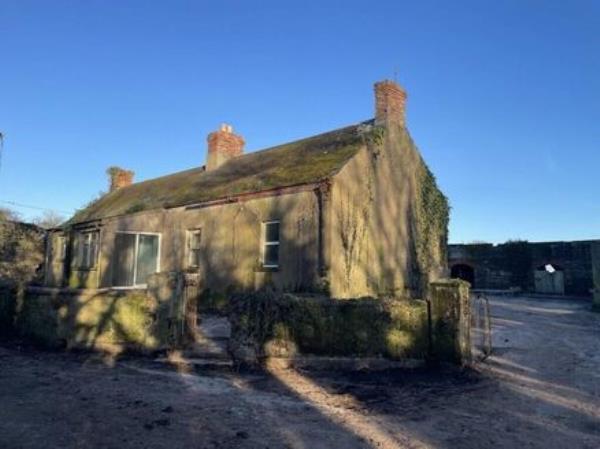 The old farmhouse on the property.