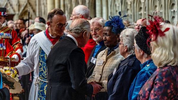 Britiain's Queen Elizabeth II accompanied by HRH the Duke of Edingburgh at the annual Maundy Thursday April 13, 2006 Service at Guildford Cathedral, Surrey. 
