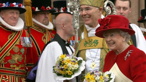Queen Elizabeth II walks with Archbishop Alan Harper after the Maundy service at St Patrick's Cathedral in March 2008. Pic: AP