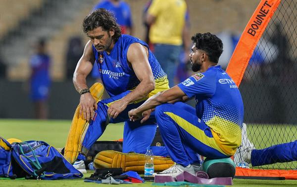 Chennai Super Kings new captain Ruturaj Gaikwad with his predecessor MS Dhoni during a training session ahead of the Indian Premier League opener against Royal Challengers Bengaluru in Chennai, Thursday, March 21, 2024.