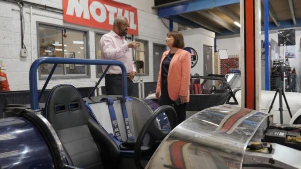 Cleverly at a sports car manufacturer 