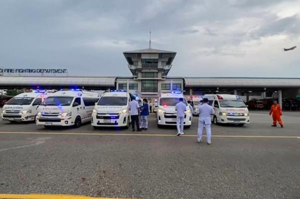 medical staff gather near ambulances at the fire station at Suvarnabhumi Airport 