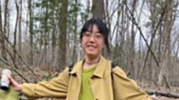 Kexin Cai in the woods