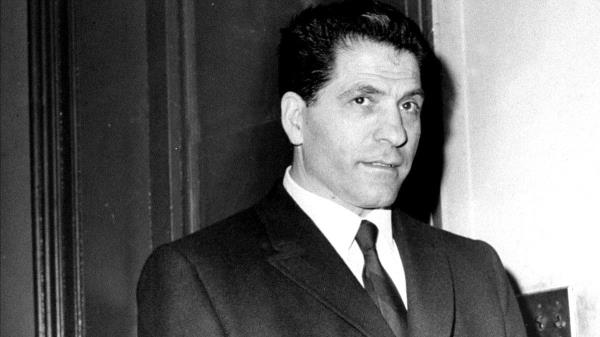 So<em></em>nny Franzese wearing a suit holding his hands.