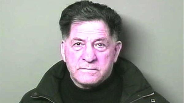 A mugshot of So<em></em>nny Franzese wearing black