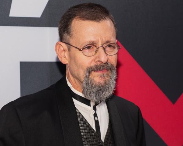 Judd Nelson, a bearded man with glasses, attending the 24th Annual Academy Awards Celebration for Justice For Women Internatio<em></em>nal and Children Uniting Nations in Beverly Hills, California