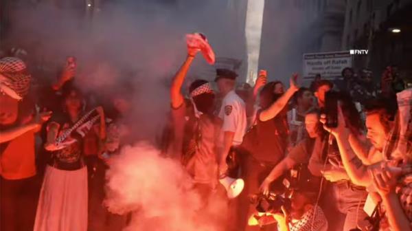 Palestine protesters are marching and rallying on Wall Street in Lower Manhattan