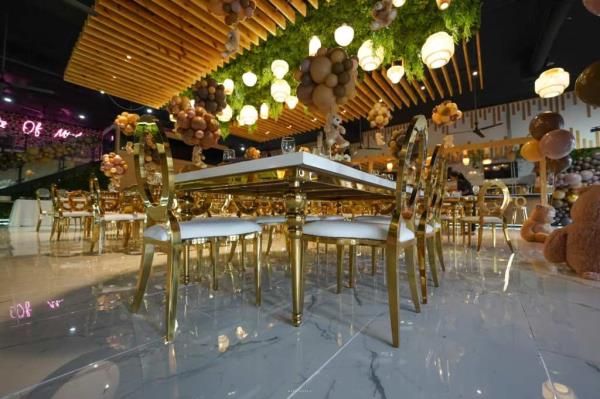 Rep. Nancy Pelosi (D-CA) (C) embraces recording artist Curtis 