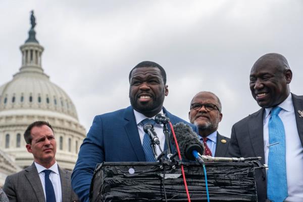 50 Cent, Representative Troy Carter (D-LA), and Attorney Ben Crump speak during a press co<em></em>nference near the Capitol after meeting with lawmakers to discuss to minority representation in entrepreneurship on Capitol Hill, Washington, on June 5, 2024. 