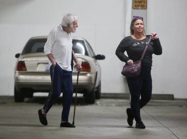 Van Dyke and his wife head out on their shopping spree.