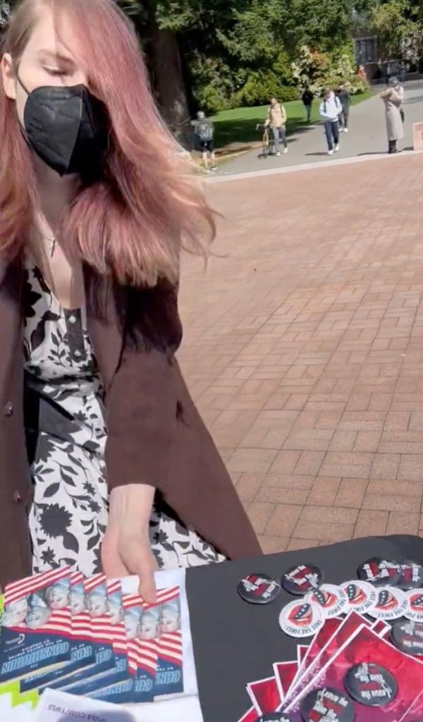 After insulting the members, the enraged student grabbed the table and flipped it over, sending the papers flying across the pavement, according to the video.</p>

<p>　　