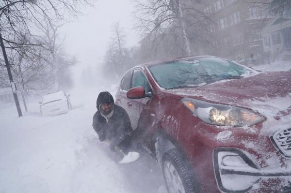 car on Lafayette Avenue after he got stuck in a snowdrift