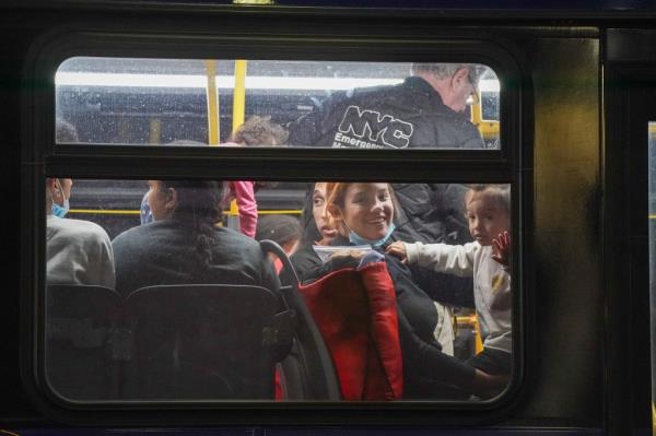 Bus transporting recently arrived migrants from Texas to a shelter in NYC.