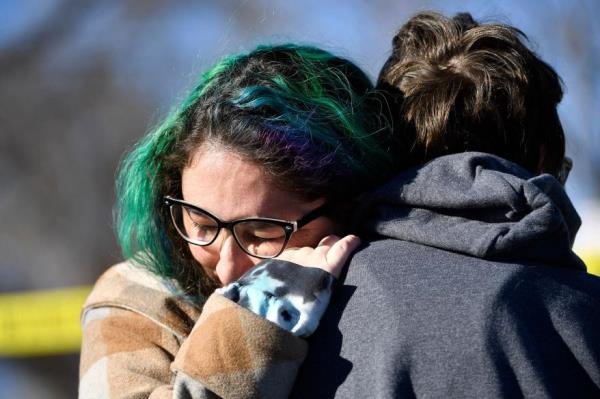Jessy Smith Cruz embraces Jadzia Dax McClendon the morning after a mass shooting at Club Q.