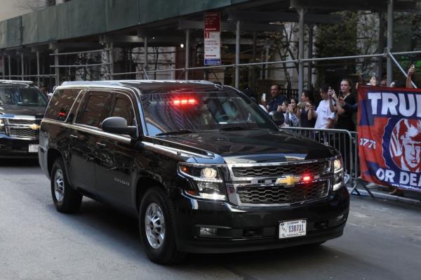 Trump's motorcade arrives at James' office. 