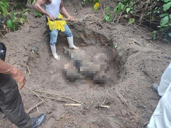 Shallow grave wher<em></em>e bodies were found