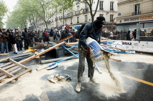 Protesters mobilize against the French pension reform law and for social justice.