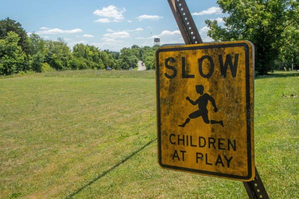 Whiskey fungus grows on a sign in Lawrenceburg near the Wild Turkey distillery and bourbon warehouses.
