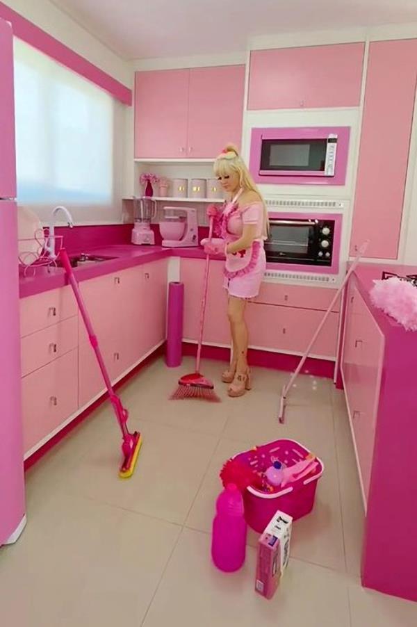 All pink kitchen that Peres is cleaning