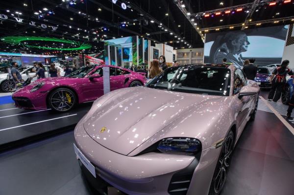 he new Porsche Taycan is seen during the 44th Bangkok Internatio<em></em>nal Motor Show 2023 at IMPACT in Bangkok, Thailand.