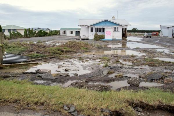 A house after being devastated by floodwater in Hawkes Bay, New Zealand, Friday, Feb. 17, 2023.