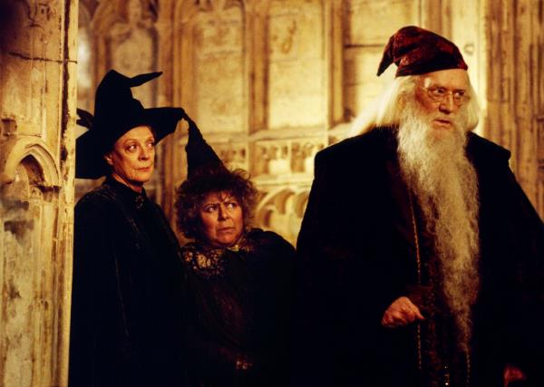 Richard Harris as Dumbledore (with Maggie Smith and Miriam Margolyes) in a scene from 
