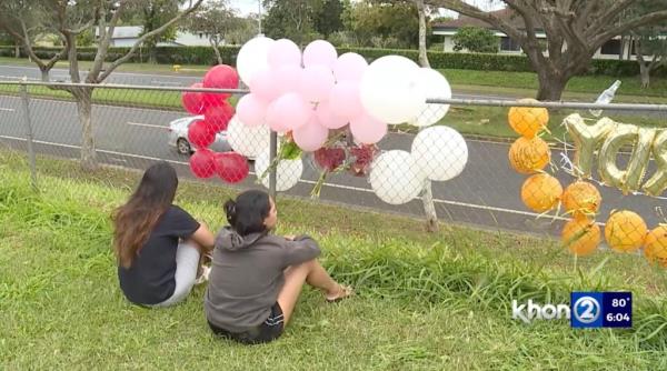 A makeshift memorial was placed were Laulusa was killed. 