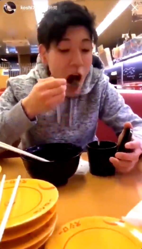 Customer rubbing saliva on food.