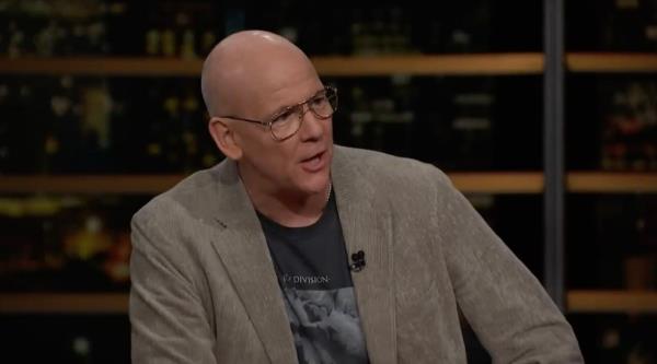 John Heilemann arguing with Russell Brand on 