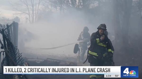 A picture of firefighters at the scene of the crime.