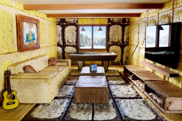 The game room features a Frosted Chocolate Fudge TV stand, tiny billiards table, and Frosted Brown Sugar Cinnamon sofa.