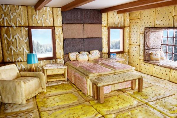 The bedroom features a vintage unfrosted headboard, Frosted Chocolate Fudge reading nook, restored Frosted Apple Fritter wallpaper, Frosted Cherry king-sized bed, Frosted Brown Sugar Cinnamon recliner and edible Frosted Raspberry nightstands.