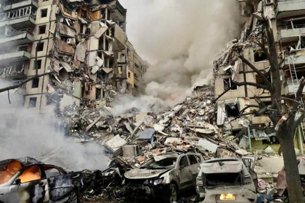 Missile debris caused fires and damaged apartment buildings and other homes outside the capital, officials said.