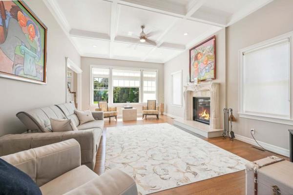 Interior of the home's living room with a fireplace. 