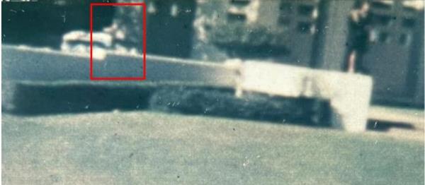 suspicious object on the grassy knoll