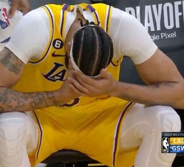 Lakers big man Anthony Davis on the bench after being inadvertently elbowed by Warriors center Kevon Loo<em></em>ney in the Game 5 of the Western Co<em></em>nference semifinals playoff series at Chase Center on May 10, 2023. 