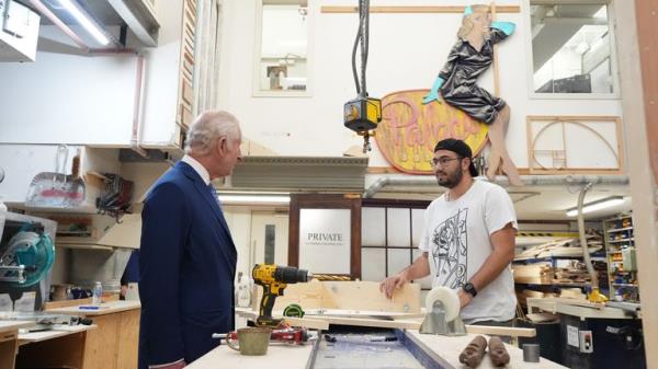 King Charles III, Patron of the Royal Academy of Dramatic Art (RADA), tour the Scenic Art Studio during a visit to RADA in London, to celebrate the school's 120th anniversary. Picture date: Wednesday May 29, 2024.