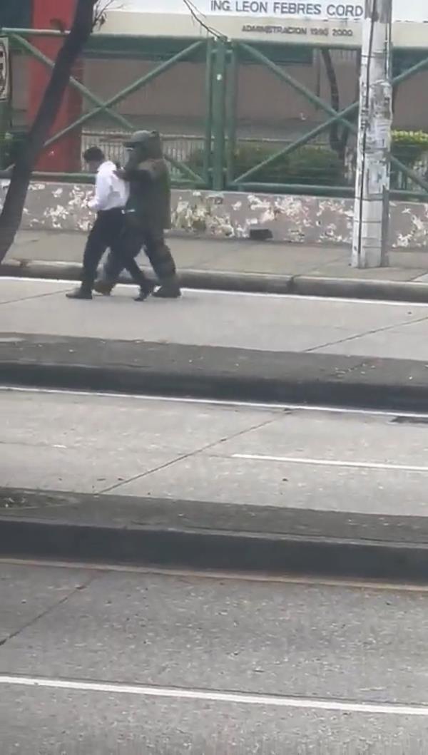 Man walking with bomb-disposal expert