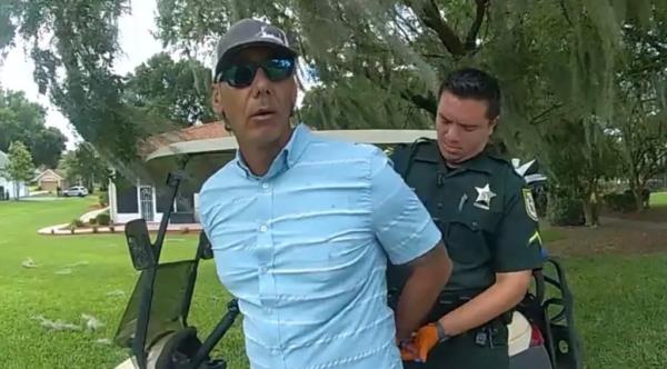Orobitg being arrested Sunday after allegedly attacking a doctor with a golf club.