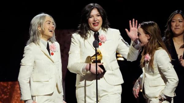 Phoebe Bridgers, from left, Lucy Dacus and Julien Baker, of boygenius accept the award for best rock performance 