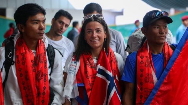 Norwegian climber Kristin Harila(C) and Tenjen Sherpa(L) at the Tribhuvan Internatio<em></em>nal Airport in Kathmandu on 5th August, 2023