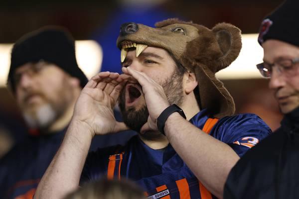 A Bears fan yells toward the Bears sideline after a third-down attempt in the third quarter against the Panthers at Soldier Field on Nov. 9, 2023.