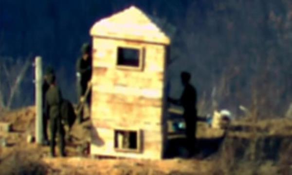 Photo purporting to show North Korean soldiers rebuilding a guard post on the North side of the DMZ