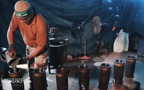 Screengrab from tweet FJ @Natsecjeff Interesting video released by al-Qassam Brigades (Hamas' military wing) showing how it digs out water pipes meant for Gazans and uses them to make rockets that are fired indiscriminately at Israel.