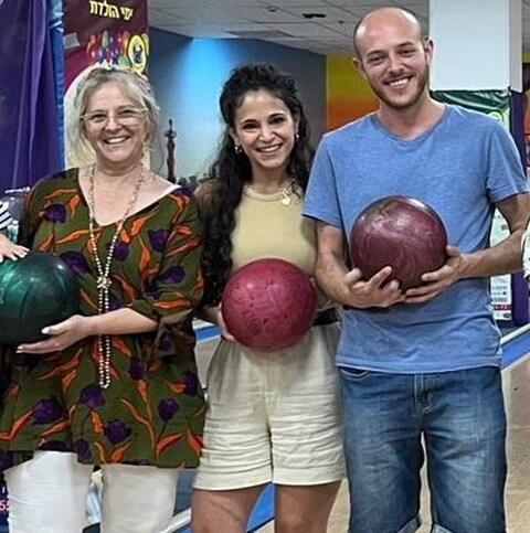 Miryam Shafir with her son Dor Shafir and his fiancée Savion Kiper