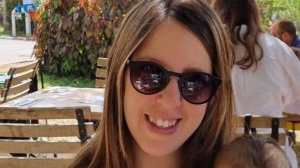 Doron Katz-Asher, an Israeli hostage released by Hamas. Cannot co<em></em>nfirm name of child in this pic. Family handout.