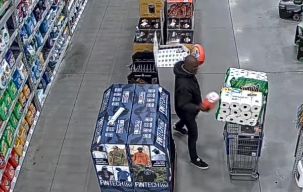 The man was caught on surveillance getting paper towels and Tide PODS. 
