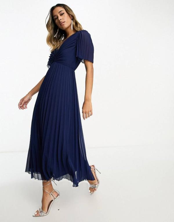 woman wearing asos wedding guest midi dress